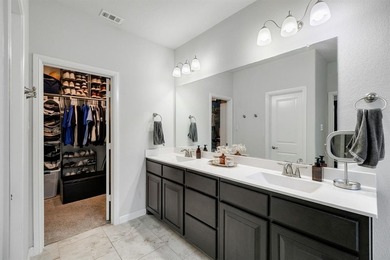 Welcome to this beautifully maintained DR Horton home built in on The Golf Club At Champions Circle in Texas - for sale on GolfHomes.com, golf home, golf lot