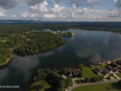 Charming Lakefront home! Embrace a lifestyle of comfort and on Lake Tansi Village Country Club in Tennessee - for sale on GolfHomes.com, golf home, golf lot