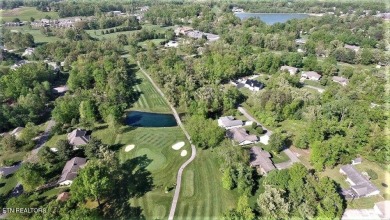 Charming Lakefront home! Embrace a lifestyle of comfort and on Lake Tansi Village Country Club in Tennessee - for sale on GolfHomes.com, golf home, golf lot