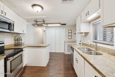 Beautifully updated 2BR, 2BA home on a rare large double corner on Sun Lakes Country Club in Arizona - for sale on GolfHomes.com, golf home, golf lot