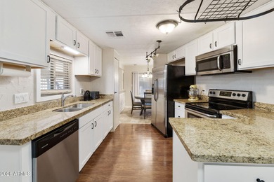 Beautifully updated 2BR, 2BA home on a rare large double corner on Sun Lakes Country Club in Arizona - for sale on GolfHomes.com, golf home, golf lot