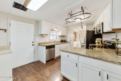 Beautifully updated 2BR, 2BA home on a rare large double corner on Sun Lakes Country Club in Arizona - for sale on GolfHomes.com, golf home, golf lot