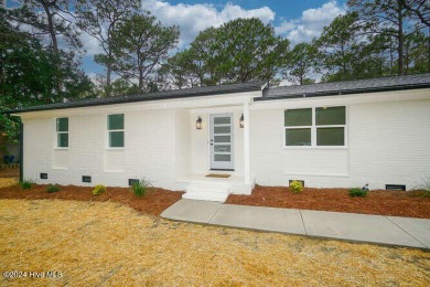 This beautifully renovated single-story home offers a modern on The Lakes Country Club in North Carolina - for sale on GolfHomes.com, golf home, golf lot