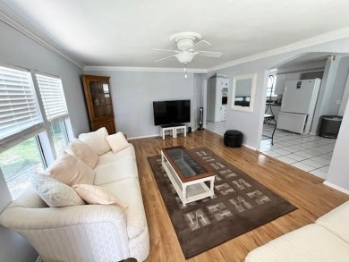 If you've been searching for a quaint, affordable stucco home on Del Tura Golf and Country Club in Florida - for sale on GolfHomes.com, golf home, golf lot