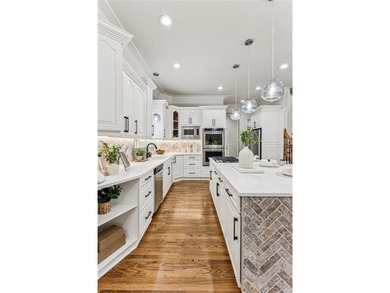 Discover this exceptional home in the sought-after, gated on Alpharetta Athletic Club East in Georgia - for sale on GolfHomes.com, golf home, golf lot