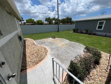 If you've been searching for a quaint, affordable stucco home on Del Tura Golf and Country Club in Florida - for sale on GolfHomes.com, golf home, golf lot