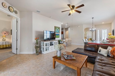 Beautiful Arbour II Villa features a Dining/Living room on Plantation Bay Golf and Country Club in Florida - for sale on GolfHomes.com, golf home, golf lot