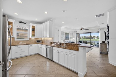 Luxuriously Upgraded Roma Model with Pond Views & Room for a on Esplanade Golf and Country at Lakewood Ranch in Florida - for sale on GolfHomes.com, golf home, golf lot