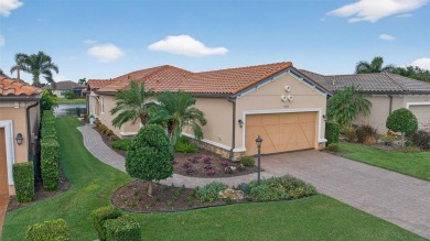 Luxuriously Upgraded Roma Model with Pond Views & Room for a on Esplanade Golf and Country at Lakewood Ranch in Florida - for sale on GolfHomes.com, golf home, golf lot