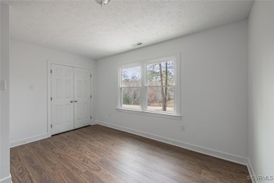 Experience refined elegance in this remodeled 3-bedroom, 2 on The Brookwoods Golf Club in Virginia - for sale on GolfHomes.com, golf home, golf lot