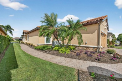 Luxuriously Upgraded Roma Model with Pond Views & Room for a on Esplanade Golf and Country at Lakewood Ranch in Florida - for sale on GolfHomes.com, golf home, golf lot