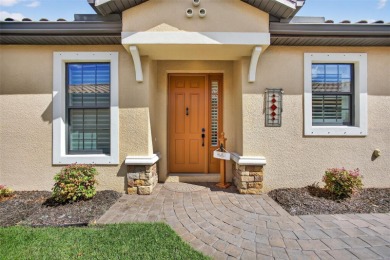 Luxuriously Upgraded Roma Model with Pond Views & Room for a on Esplanade Golf and Country at Lakewood Ranch in Florida - for sale on GolfHomes.com, golf home, golf lot