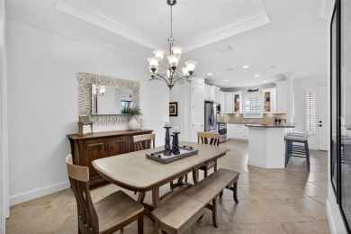 Luxuriously Upgraded Roma Model with Pond Views & Room for a on Esplanade Golf and Country at Lakewood Ranch in Florida - for sale on GolfHomes.com, golf home, golf lot