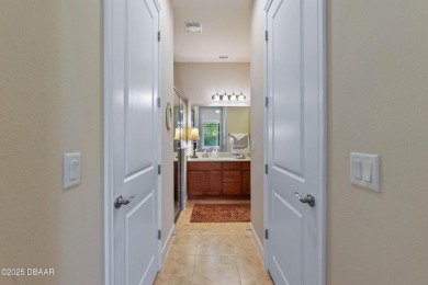 Beautiful Arbour II Villa features a Dining/Living room on Plantation Bay Golf and Country Club in Florida - for sale on GolfHomes.com, golf home, golf lot