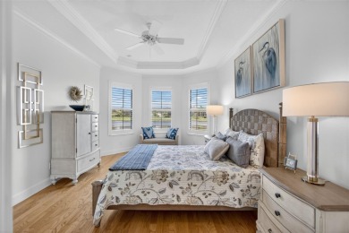 Luxuriously Upgraded Roma Model with Pond Views & Room for a on Esplanade Golf and Country at Lakewood Ranch in Florida - for sale on GolfHomes.com, golf home, golf lot