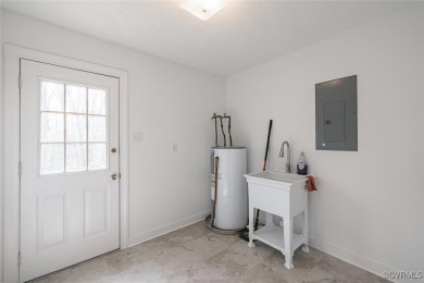 Experience refined elegance in this remodeled 3-bedroom, 2 on The Brookwoods Golf Club in Virginia - for sale on GolfHomes.com, golf home, golf lot