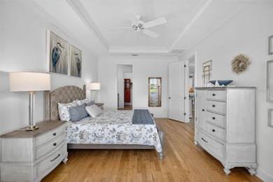 Luxuriously Upgraded Roma Model with Pond Views & Room for a on Esplanade Golf and Country at Lakewood Ranch in Florida - for sale on GolfHomes.com, golf home, golf lot