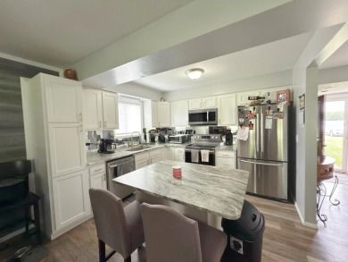 Updated Condo on Woodland Hills Golf Course - No HOA Fees! Don't on Woodland Hills Golf Course in Michigan - for sale on GolfHomes.com, golf home, golf lot