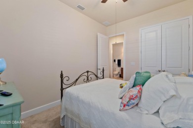 Beautiful Arbour II Villa features a Dining/Living room on Plantation Bay Golf and Country Club in Florida - for sale on GolfHomes.com, golf home, golf lot