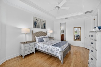 Luxuriously Upgraded Roma Model with Pond Views & Room for a on Esplanade Golf and Country at Lakewood Ranch in Florida - for sale on GolfHomes.com, golf home, golf lot