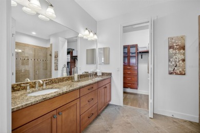 Luxuriously Upgraded Roma Model with Pond Views & Room for a on Esplanade Golf and Country at Lakewood Ranch in Florida - for sale on GolfHomes.com, golf home, golf lot