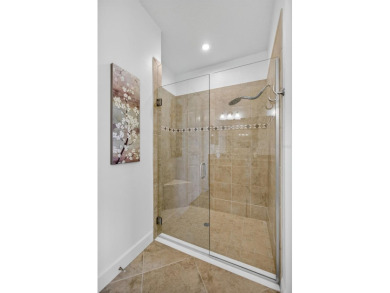 Luxuriously Upgraded Roma Model with Pond Views & Room for a on Esplanade Golf and Country at Lakewood Ranch in Florida - for sale on GolfHomes.com, golf home, golf lot