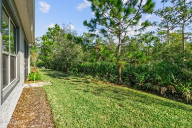 Beautiful Arbour II Villa features a Dining/Living room on Plantation Bay Golf and Country Club in Florida - for sale on GolfHomes.com, golf home, golf lot