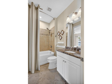 Luxuriously Upgraded Roma Model with Pond Views & Room for a on Esplanade Golf and Country at Lakewood Ranch in Florida - for sale on GolfHomes.com, golf home, golf lot