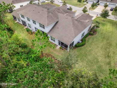 Beautiful Arbour II Villa features a Dining/Living room on Plantation Bay Golf and Country Club in Florida - for sale on GolfHomes.com, golf home, golf lot