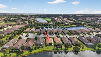Luxuriously Upgraded Roma Model with Pond Views & Room for a on Esplanade Golf and Country at Lakewood Ranch in Florida - for sale on GolfHomes.com, golf home, golf lot