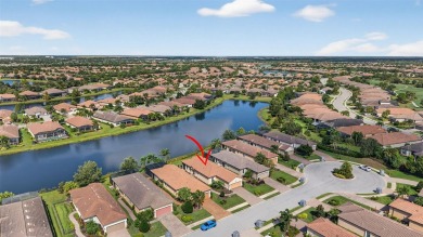 Luxuriously Upgraded Roma Model with Pond Views & Room for a on Esplanade Golf and Country at Lakewood Ranch in Florida - for sale on GolfHomes.com, golf home, golf lot