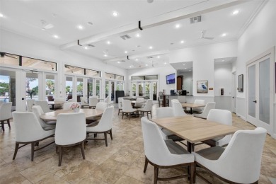 Luxuriously Upgraded Roma Model with Pond Views & Room for a on Esplanade Golf and Country at Lakewood Ranch in Florida - for sale on GolfHomes.com, golf home, golf lot