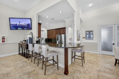 Luxuriously Upgraded Roma Model with Pond Views & Room for a on Esplanade Golf and Country at Lakewood Ranch in Florida - for sale on GolfHomes.com, golf home, golf lot