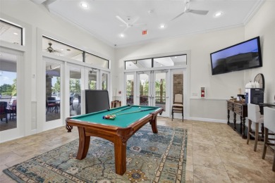 Luxuriously Upgraded Roma Model with Pond Views & Room for a on Esplanade Golf and Country at Lakewood Ranch in Florida - for sale on GolfHomes.com, golf home, golf lot