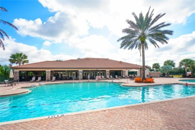 Luxuriously Upgraded Roma Model with Pond Views & Room for a on Esplanade Golf and Country at Lakewood Ranch in Florida - for sale on GolfHomes.com, golf home, golf lot