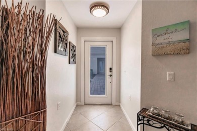 If you've been waiting for a main floor condo with a two-car on  in Florida - for sale on GolfHomes.com, golf home, golf lot
