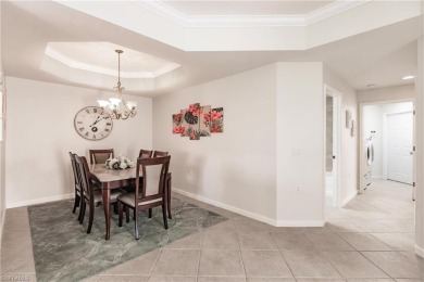 If you've been waiting for a main floor condo with a two-car on  in Florida - for sale on GolfHomes.com, golf home, golf lot