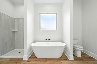 This CUSTOM built modern New Orleans style shotgun house has 3 on Millbrook Country Club in Mississippi - for sale on GolfHomes.com, golf home, golf lot