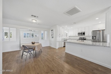 Welcome To This Updated And Expanded Shasta Model Home In Sun on Sun City Lakes West and East in Arizona - for sale on GolfHomes.com, golf home, golf lot