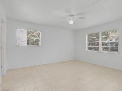 Welcome to 499 Forest Lakes Blvd #207, a freshly painted and on Quail Run Golf Club In Naples in Florida - for sale on GolfHomes.com, golf home, golf lot