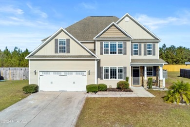 Welcome home to this stunning 5-bedroom, 4.5-bathroom gem in the on Bear Trail Golf Club in North Carolina - for sale on GolfHomes.com, golf home, golf lot