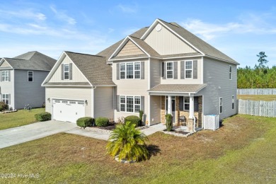 Welcome home to this stunning 5-bedroom, 4.5-bathroom gem in the on Bear Trail Golf Club in North Carolina - for sale on GolfHomes.com, golf home, golf lot