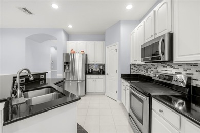 Welcome to your sunshine retreat at 3009 Banyan Hill Ln in the on Plantation Palms Golf Club in Florida - for sale on GolfHomes.com, golf home, golf lot