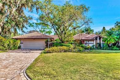 Exceptional 4 Bed, 4 Bath Home Offers Refined Living with on Palm Aire Country Club of Sarasota in Florida - for sale on GolfHomes.com, golf home, golf lot