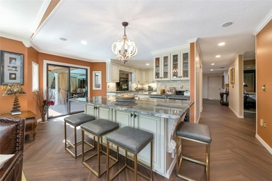 Exceptional 4 Bed, 4 Bath Home Offers Refined Living with on Palm Aire Country Club of Sarasota in Florida - for sale on GolfHomes.com, golf home, golf lot