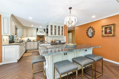 Exceptional 4 Bed, 4 Bath Home Offers Refined Living with on Palm Aire Country Club of Sarasota in Florida - for sale on GolfHomes.com, golf home, golf lot