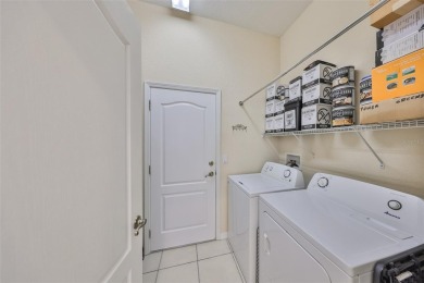 TERRIFIC PRICE IMPROVEMENT FOR THIS CHARMING HOME WITH PRETTY on Sandpiper Golf Club in Florida - for sale on GolfHomes.com, golf home, golf lot