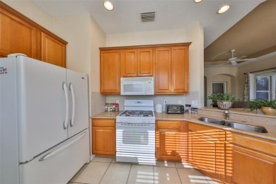 TERRIFIC PRICE IMPROVEMENT FOR THIS CHARMING HOME WITH PRETTY on Sandpiper Golf Club in Florida - for sale on GolfHomes.com, golf home, golf lot