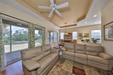 TERRIFIC PRICE IMPROVEMENT FOR THIS CHARMING HOME WITH PRETTY on Sandpiper Golf Club in Florida - for sale on GolfHomes.com, golf home, golf lot