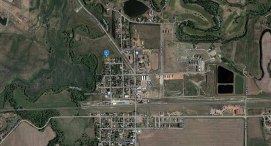 This 0.2-acre buildable lot in South Heart community with legal on Pheasant Country Golf Course in North Dakota - for sale on GolfHomes.com, golf home, golf lot